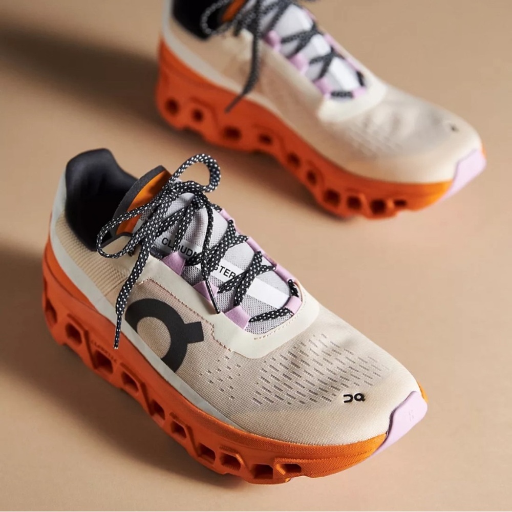 On Cloudmonster in Fawn/Tumeric